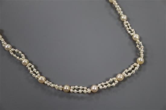 A single and part double strand cultured and seed pearl necklace, 47cm.